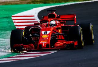 Sebastian-Vettel-Ferrari-SF71H-Barcelona-F1-2018-sparks-chicane-Photo-Ferrari-320x220